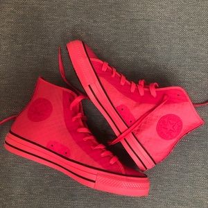 Hot pink converse high tops